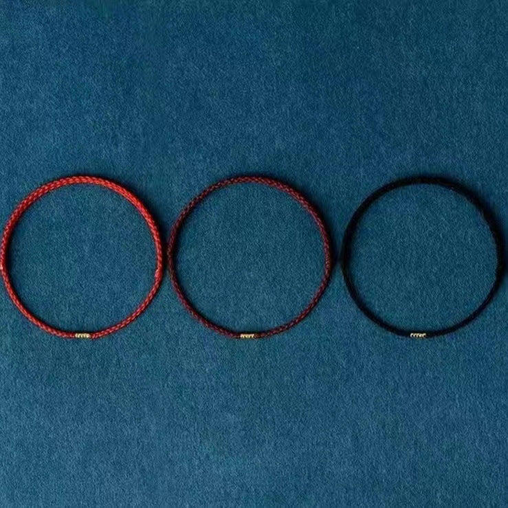 Handmade Red String Bracelet Symbolizing Fortune and Prosperity