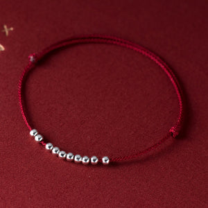 Silver Bead Bracelet handmade with red string for protection
