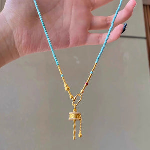 Women's turquoise Necklace with Tibetan prayer wheel pendant
