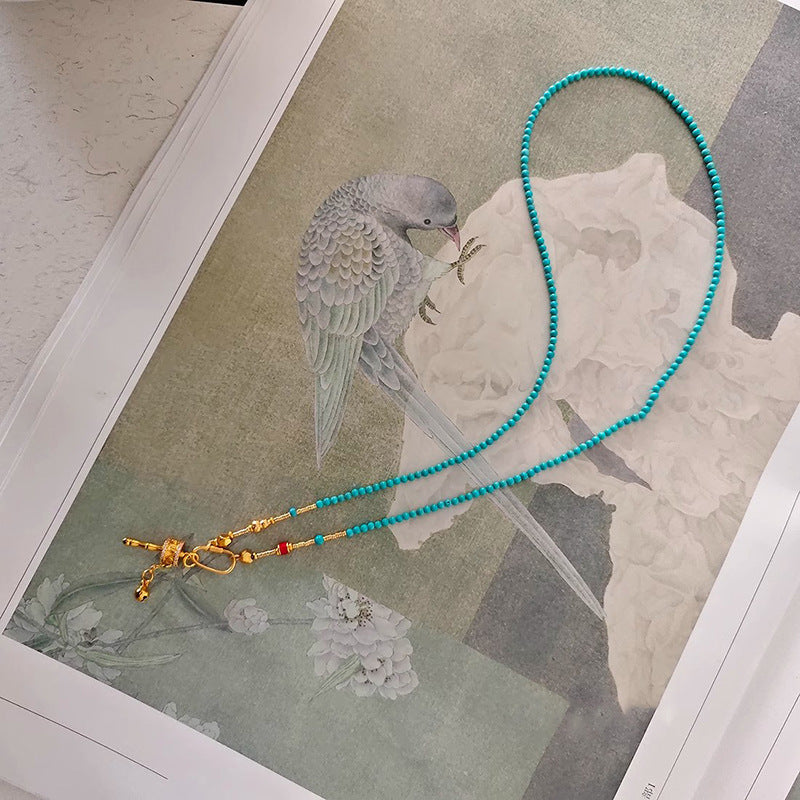 Women's turquoise Necklace with Tibetan prayer wheel pendant