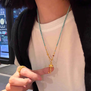 Women's turquoise Necklace with Tibetan prayer wheel pendant