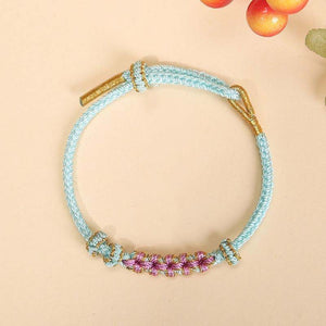light blue String Protection Bracelet with Peach Blossom