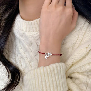 A woman wearing Red String Cute Silver Bracelet