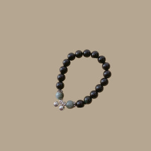 Obsidian Bracelet with Bell Charm
