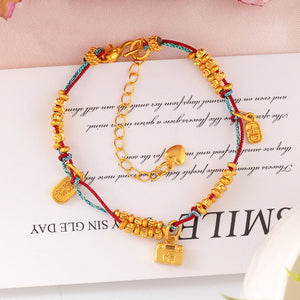 Red Rope Bracelet with Gold-Plated "Fu" Lock product image