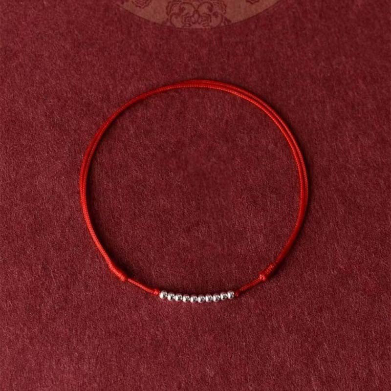 Silver Bead Bracelet with Red String for Love and Luck