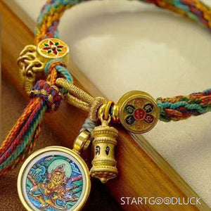 Tibetan Hand - Braided Bracelet with Yellow Jambhala Thangka: Attract Wealth - StartGoodLuck