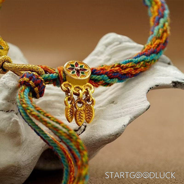 Tibetan Hand - Braided Bracelet with Yellow Jambhala Thangka: Attract Wealth - StartGoodLuck